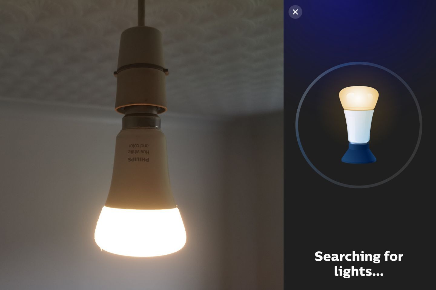A glowing LED bulb suspended from the ceiling, showcasing warm light.