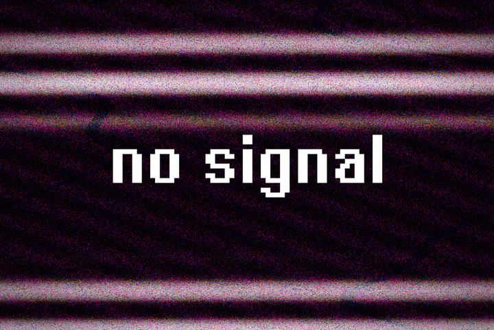 Static screen displaying the text 'no signal' in a pixelated font.