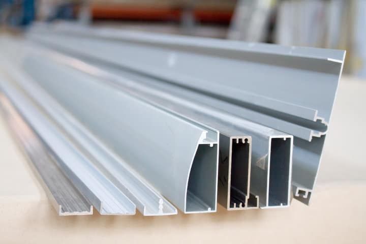 Several gray aluminum profiles used for LED lighting installation.