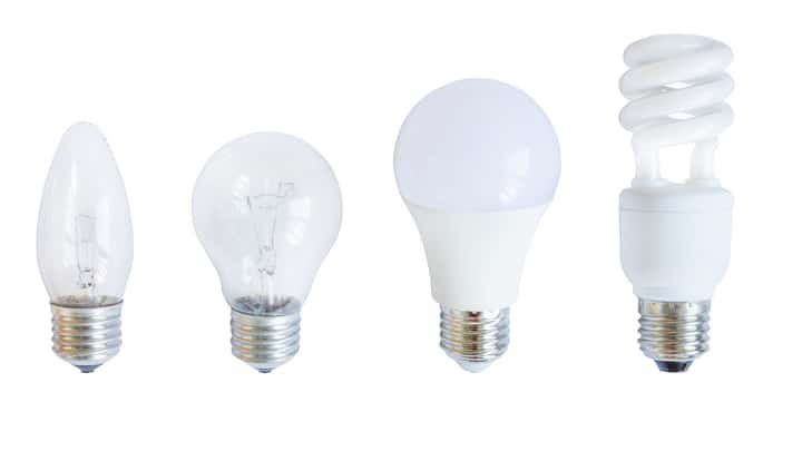 Four types of light bulbs with different shapes and designs.