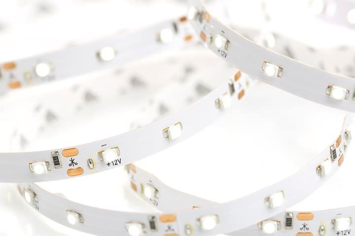 Close-up of flexible LED strip lights with small light bulbs.