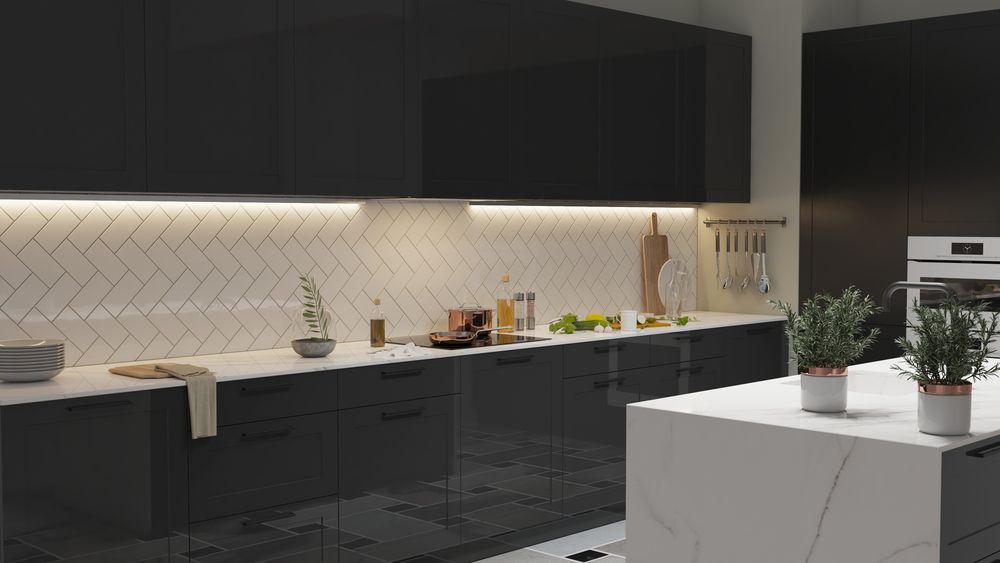 Modern kitchen featuring LED under-cabinet lighting and sleek black cabinets.