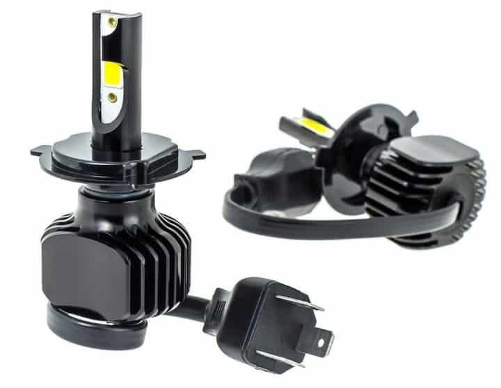 Two black LED light bulbs with connectors and cooling fins.