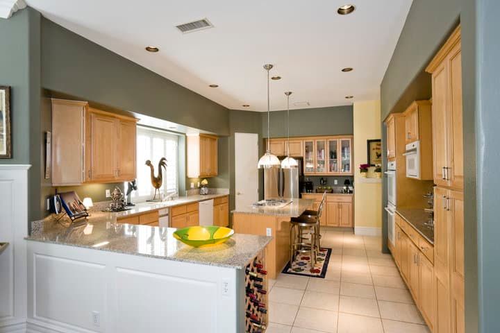Bright kitchen with modern cabinetry and a sleek countertop.