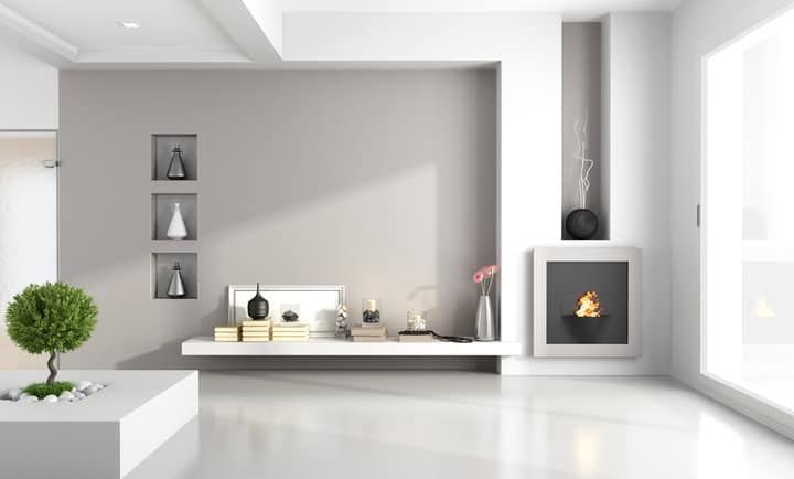Modern living space featuring a minimalist design with an elegant fireplace.