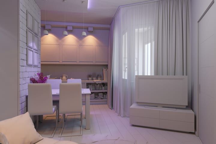 Cozy modern living space featuring LED lighting, dining area, and soft curtains.