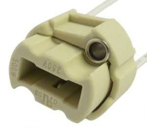 Close-up of a beige LED light bulb socket with wire connections.
