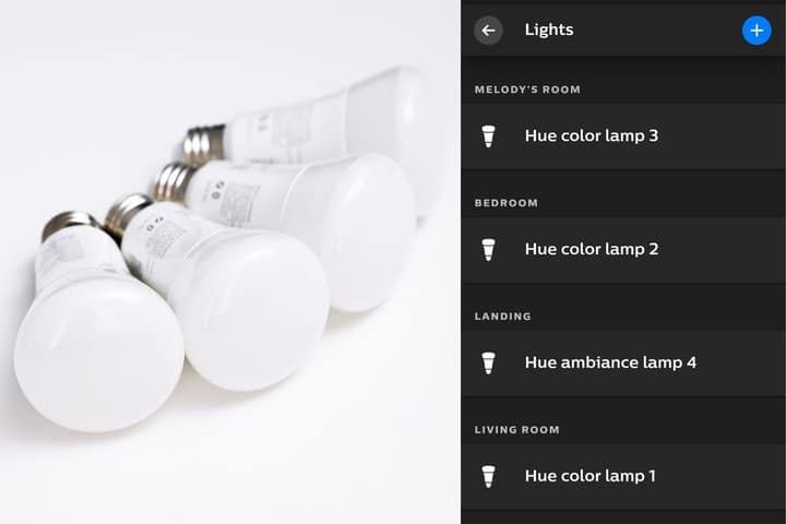 Four LED light bulbs arranged in a row on a plain background.