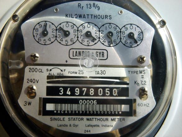Close-up of a single stator watt-hour meter displaying kilowatt-hours usage readings.