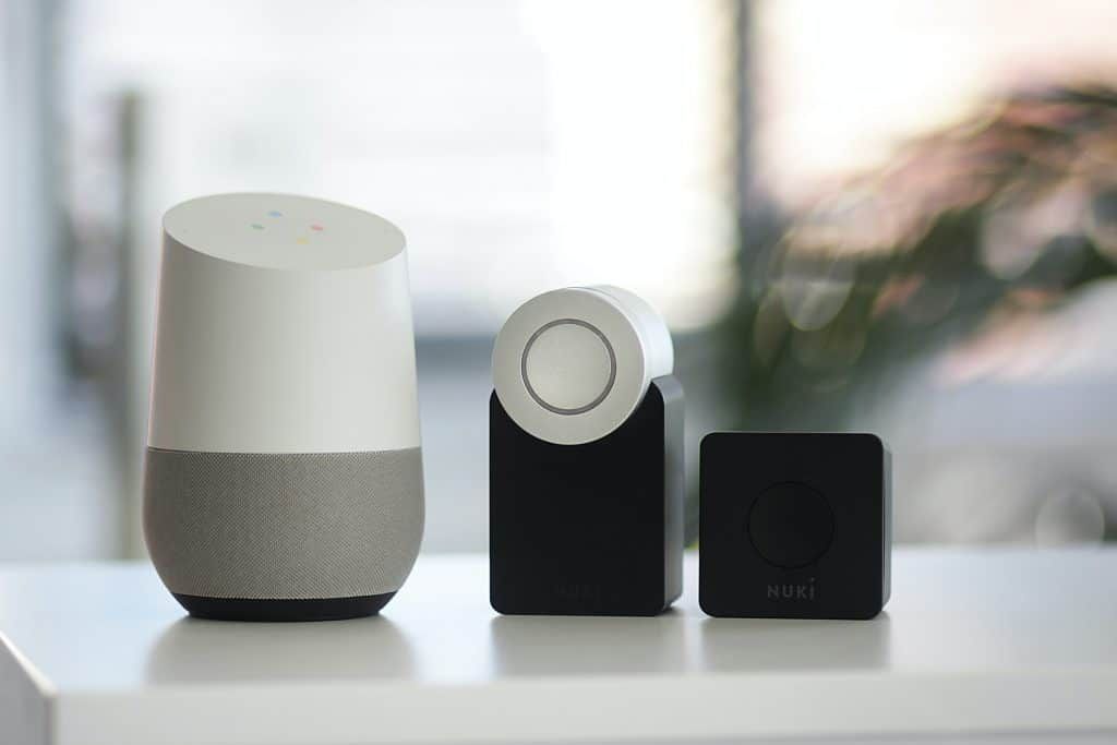 Three smart home devices for managing lighting and security features.