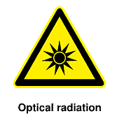 Warning sign displaying a sun symbol, indicating optical radiation hazards.