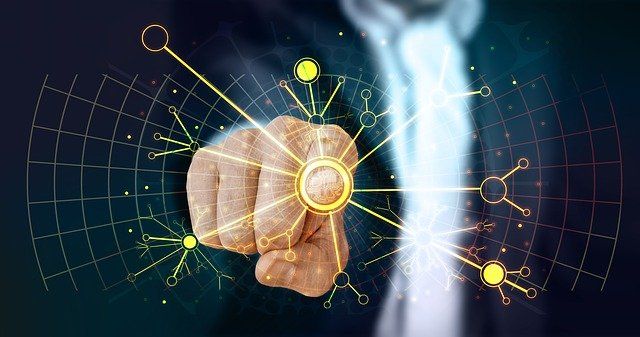 A hand pointing at a digital interface with glowing connections.